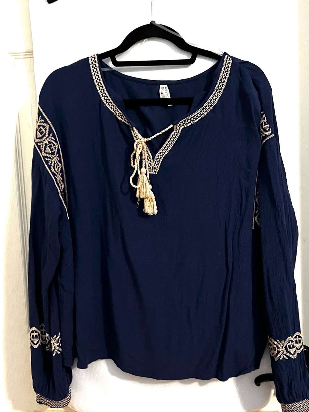 MUDD Navy blue long sleeve blouse with cream embroidery and tassel detail, size